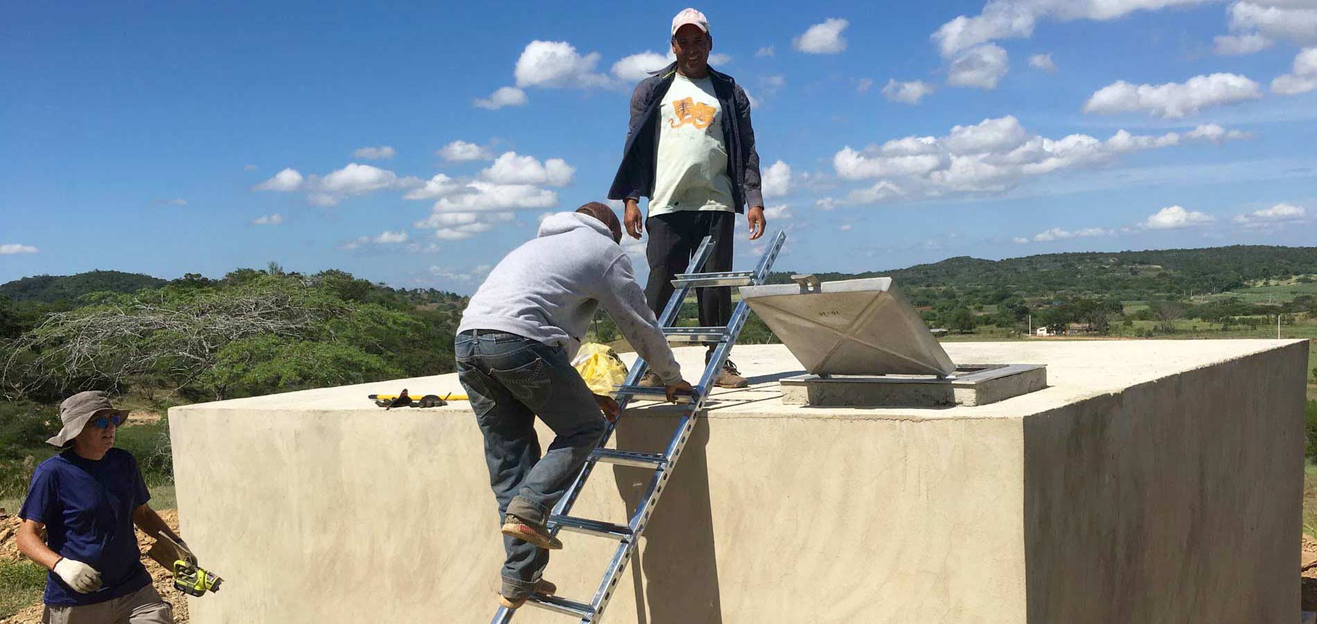 The tank gets finishing touches. The next step is the installation of the water pump and water distribution piping, then comes the chlorination system.